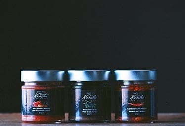 Three Nicastro canned food